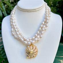 PEARL TRIPLE STRAND + SEASHELL PENDANT